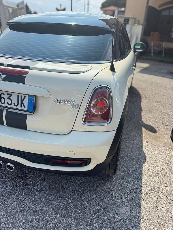 Usata Mini Coupé 143 CV (105 kW) 2013 Giallo Coupé