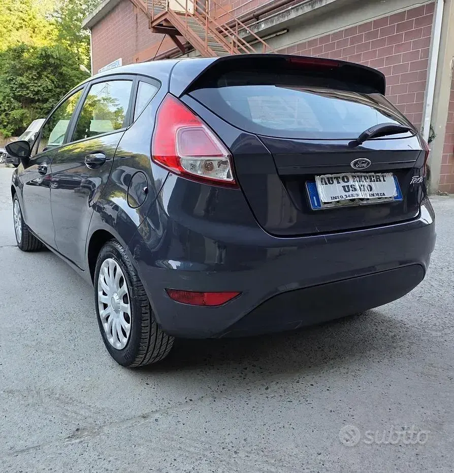 Second-hand Ford Fiesta Titanium 60 CP (44 kW) 2014 Albastru Hatchback