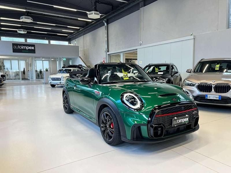 British racing green metallic Usata 2024 Mini John Cooper Works Cabriolet Cabrio | 41.800 € (Cara) - Immagine 1/4