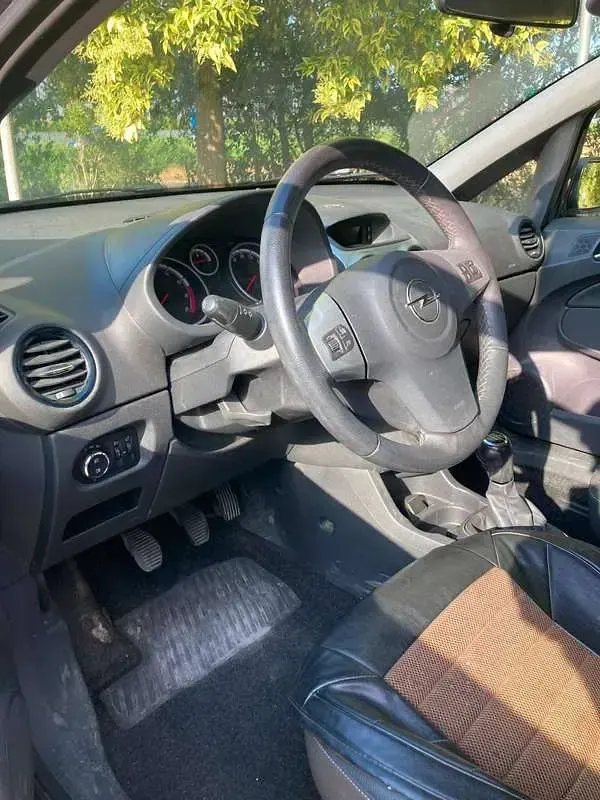 Usata Opel Corsa 86 CV (63 kW) 2013 Argento Utilitaria