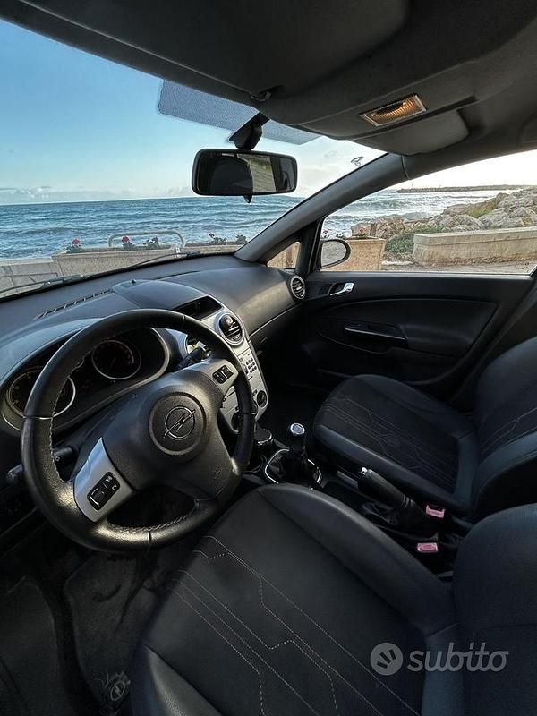 Usata Opel Corsa 75 CV (55 kW) 2012 Grigio Utilitaria