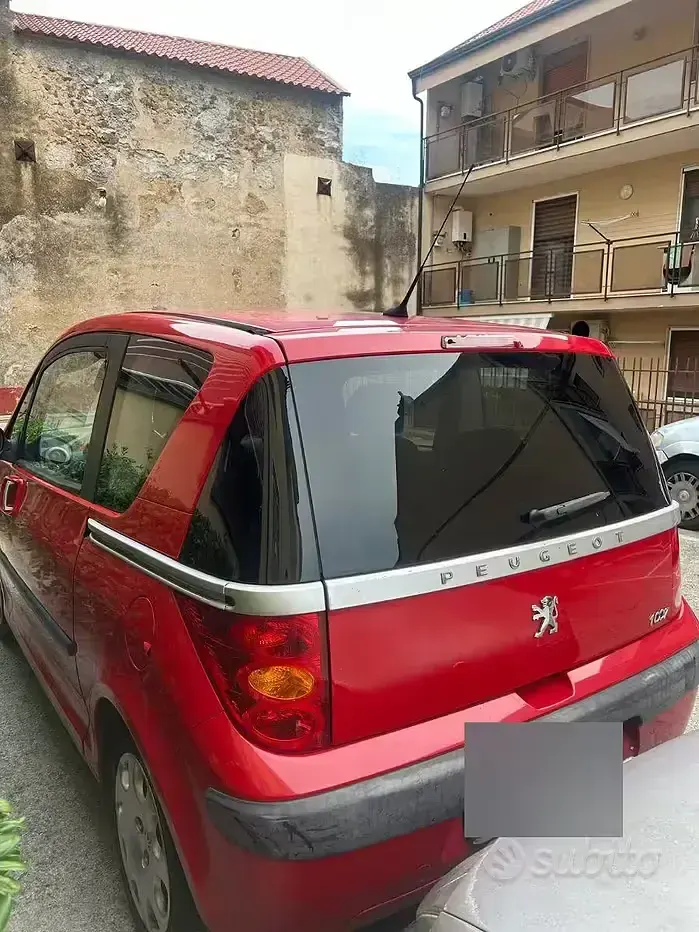 Usata Peugeot 1007 73 CV (53 kW) 2005 Rosso Monovolume