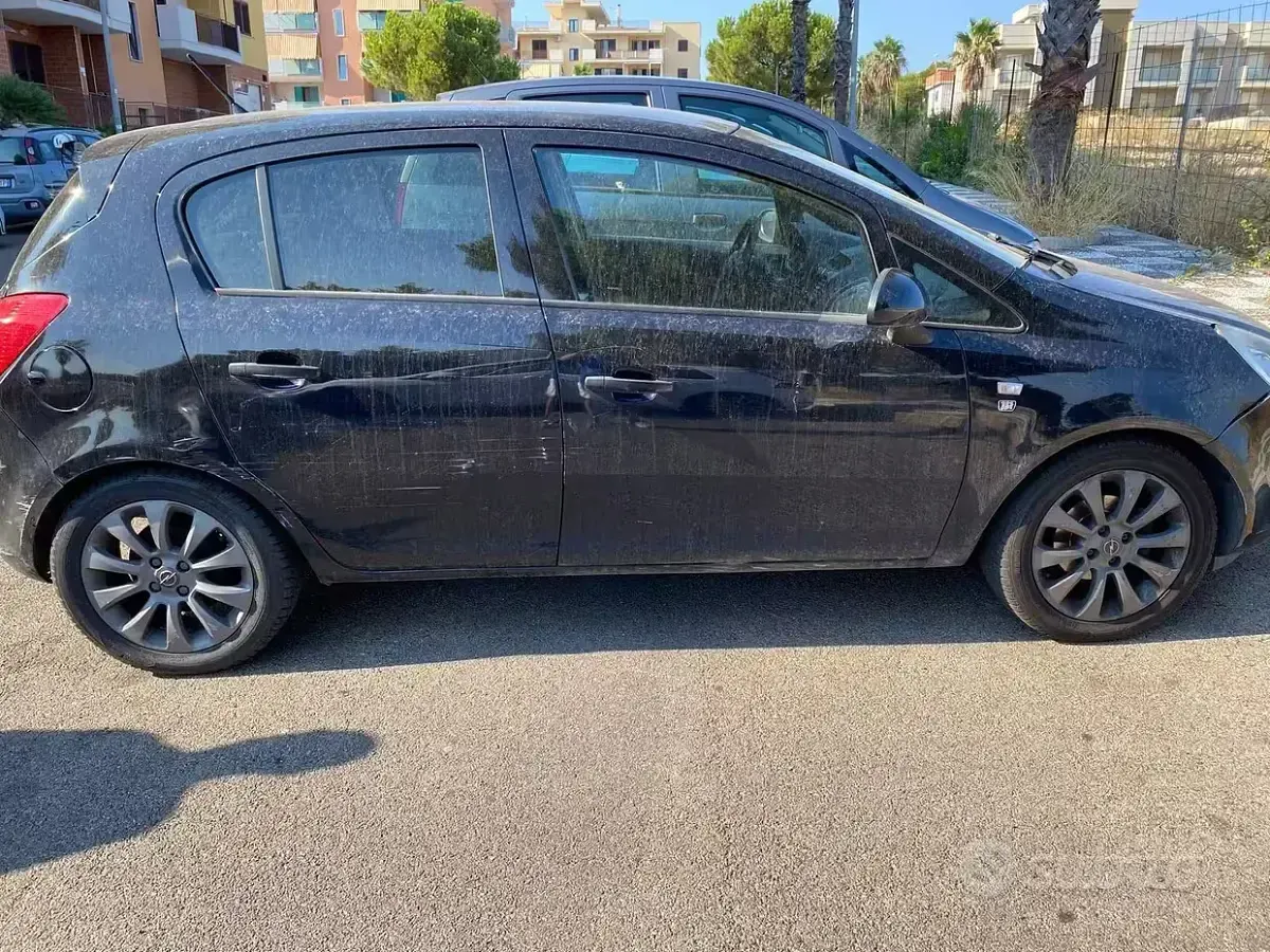 Usata Opel Corsa 80 CV (58 kW) 2010 Nero Utilitaria