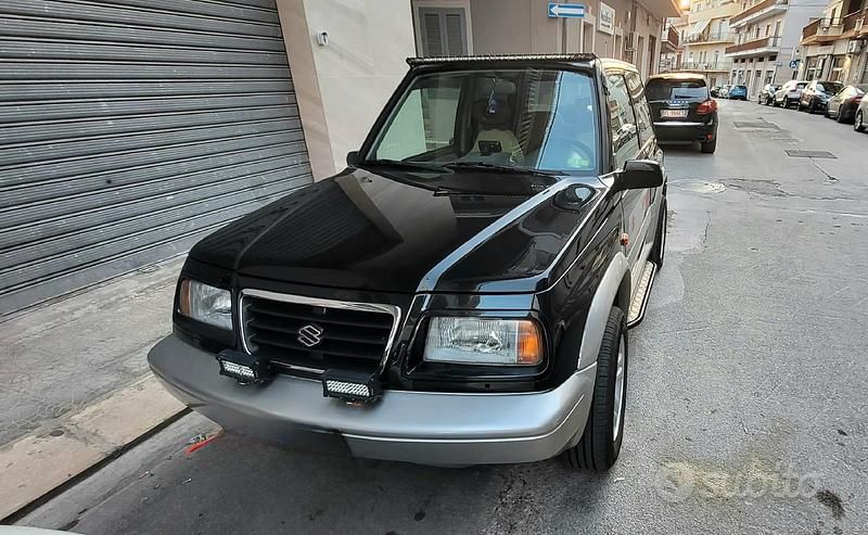 Nero Usata 1998 Suzuki Vitara SUV | 7500 € (Buon prezzo) - Immagine 1/4