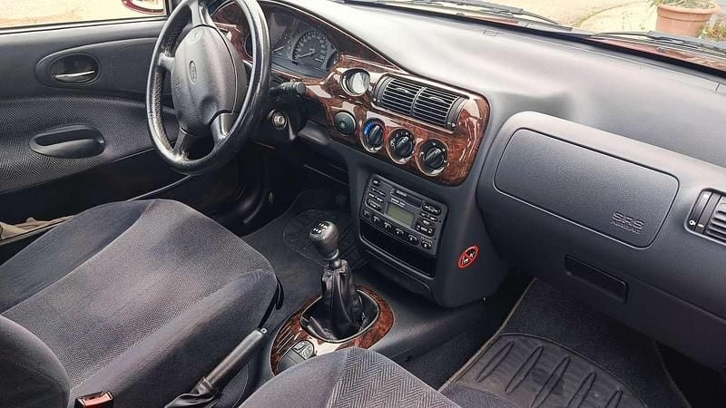 Usata Ford Escort Ghia 90 CV (66 kW) 1997 Rosso Station wagon