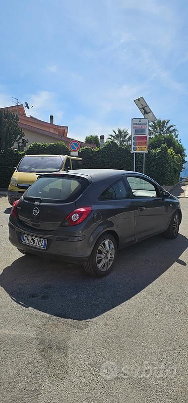 Usata Opel Corsa Club 85 CV (62 kW) 2011 Grigio Utilitaria