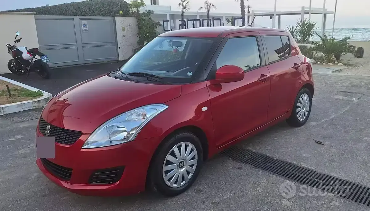 Usata Suzuki Swift 94 CV (69 kW) 2012 Rosso Utilitaria
