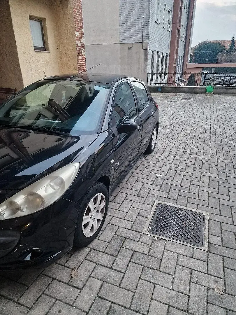 Usata Peugeot 206 60 CV (44 kW) 2011 Nero Berlina