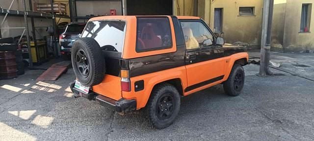 Usata Daihatsu Feroza 95 CV (69 kW) 1990 Arancione SUV