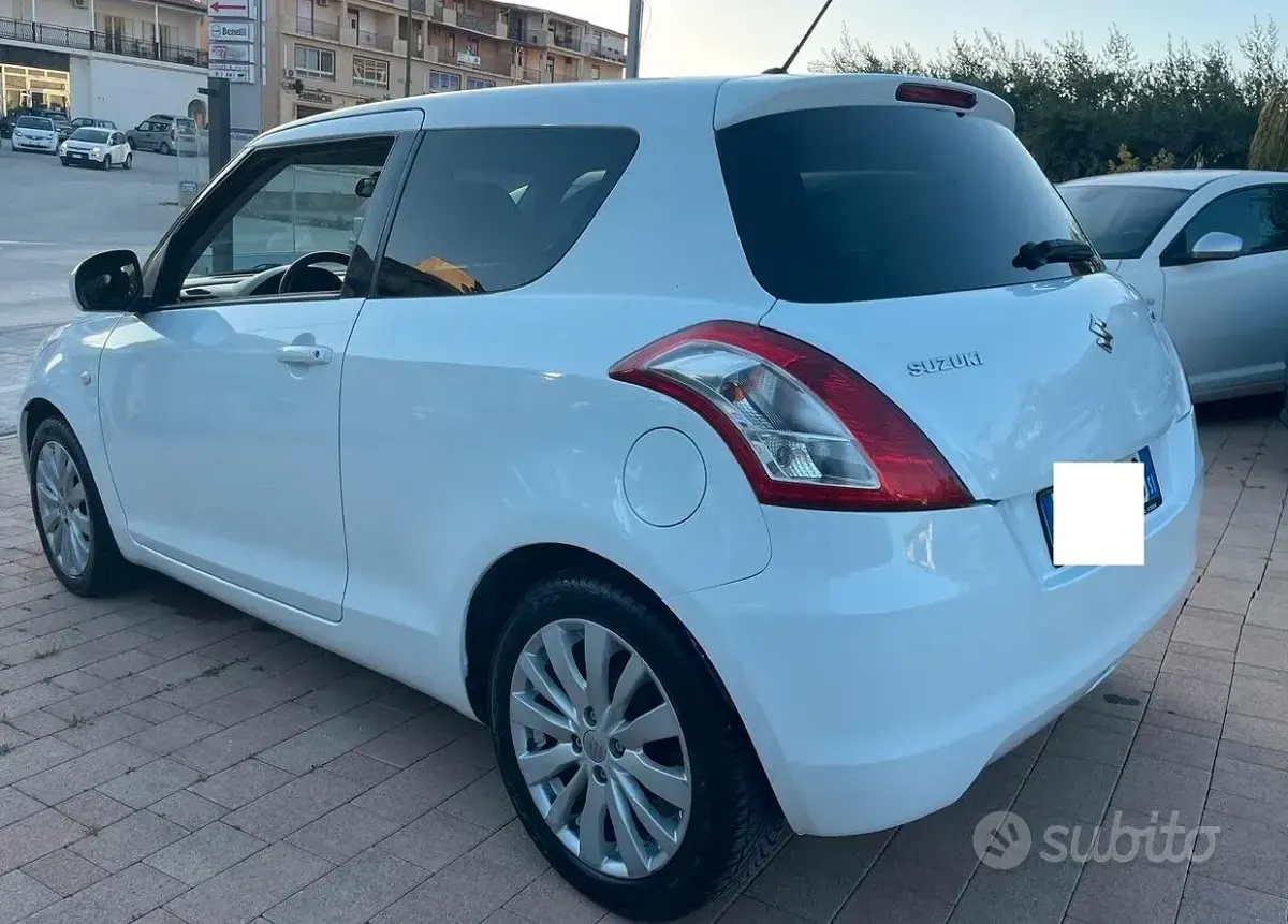 Usata Suzuki Swift 94 CV (69 kW) 2013 Bianco Utilitaria