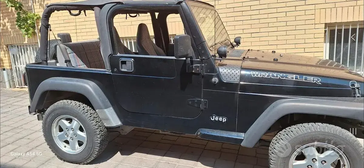 Usata Jeep Wrangler 118 CV (86 kW) 1997 Nero SUV