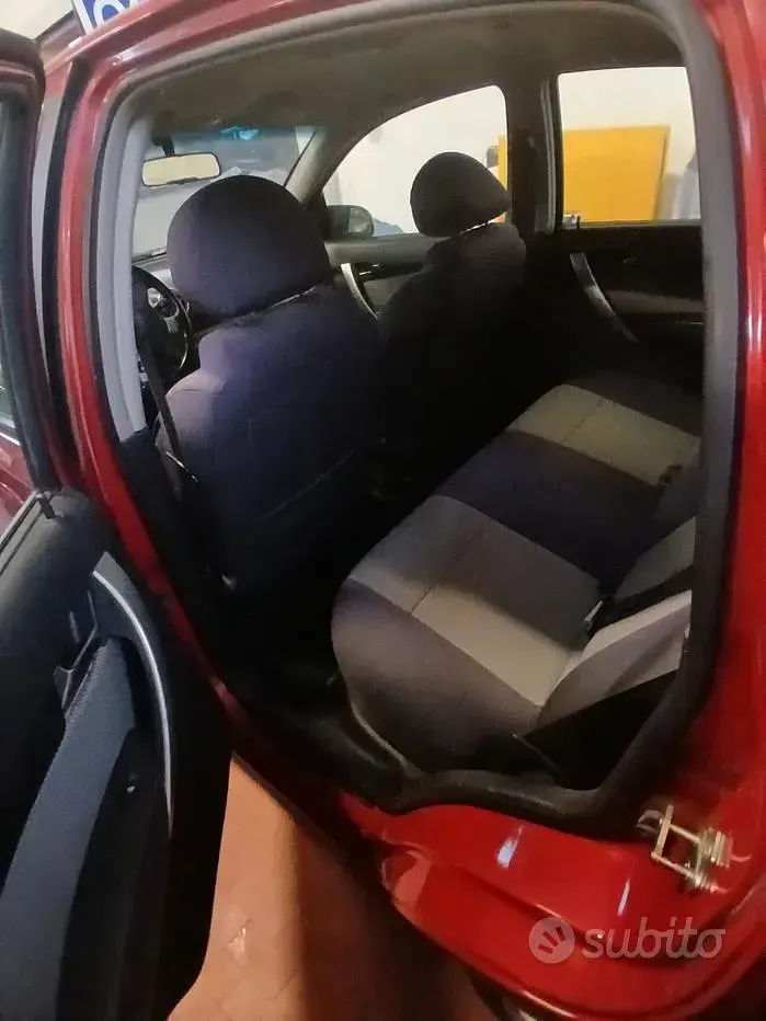 Usata Chevrolet Aveo 84 CV (61 kW) 2010 Rosso Berlina
