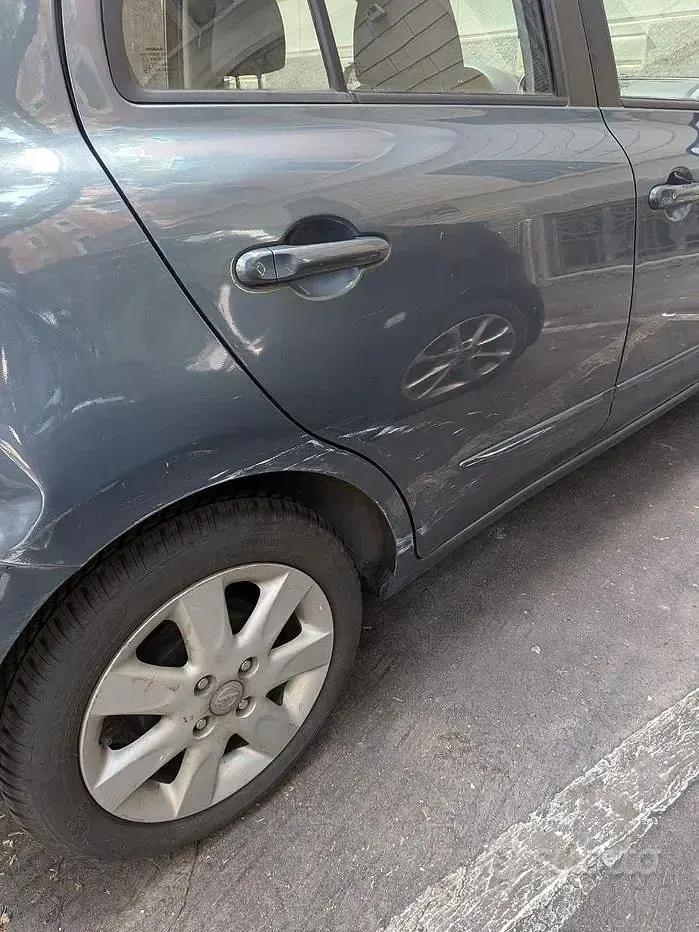 Usata Nissan Micra 80 CV (58 kW) 2011 Grigio Utilitaria