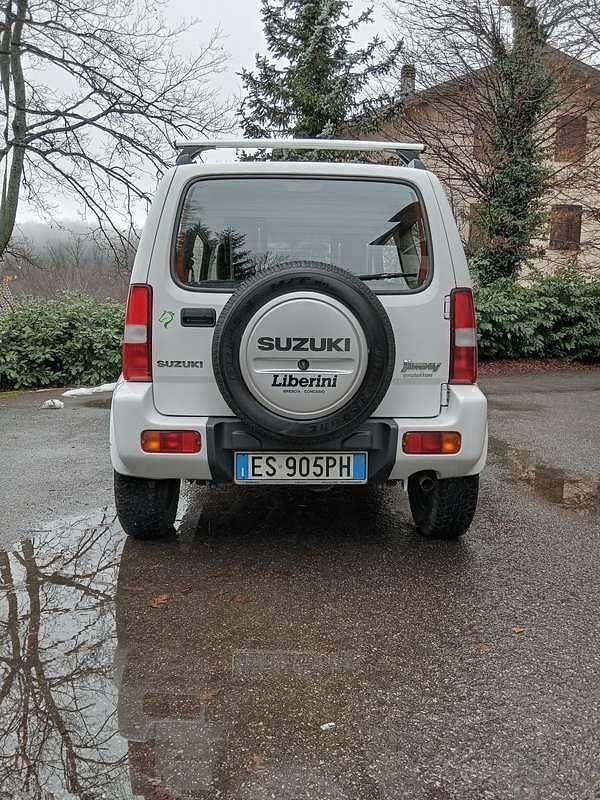 Second-hand Suzuki Jimny 86 CP (63 kW) 2013 Alb SUV