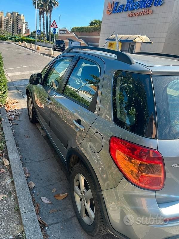 Usata Suzuki SX4 90 CV (66 kW) 2009 Marrone Berlina