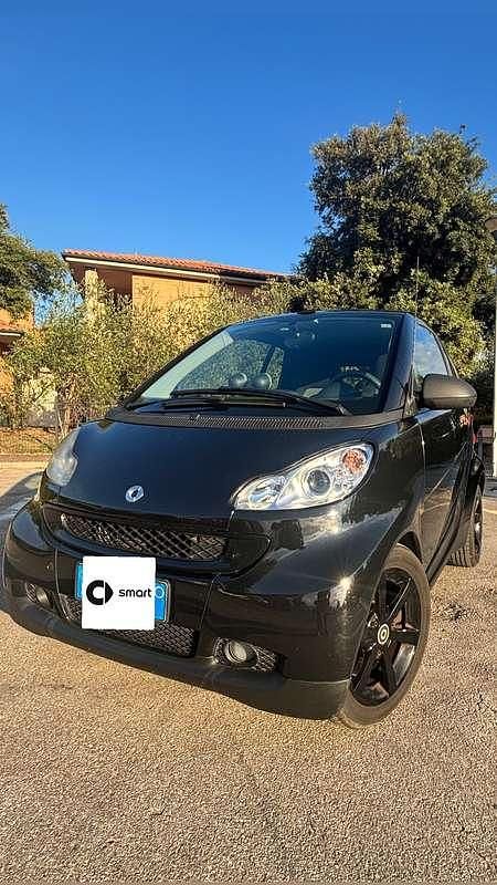 Nero Usata 2010 Smart ForTwo Cabrio Passion Cabrio | 6800 € (Cara) - Immagine 1/4
