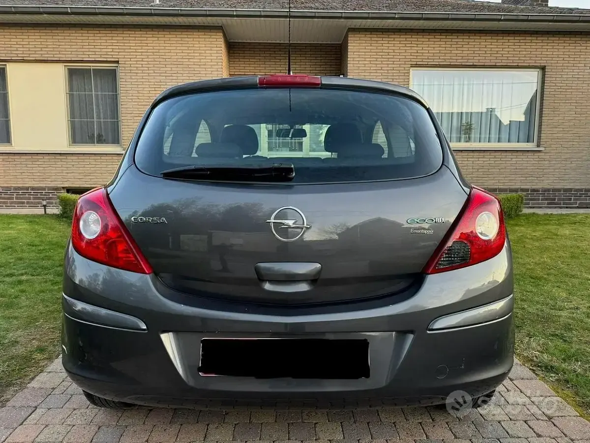 Usata Opel Corsa 95 CV (69 kW) 2010 Grigio Utilitaria