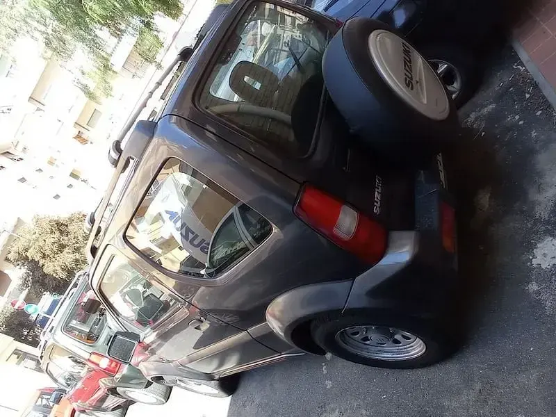 Usata Suzuki Jimny 86 CV (63 kW) 2010 Grigio scuro SUV