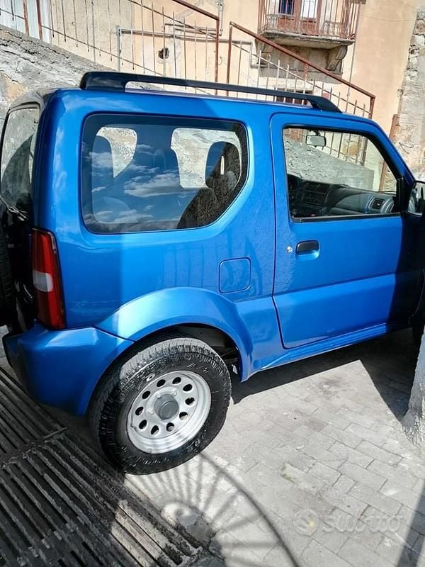 Second-hand Suzuki Jimny 82 CP (60 kW) 2003 Albastru SUV