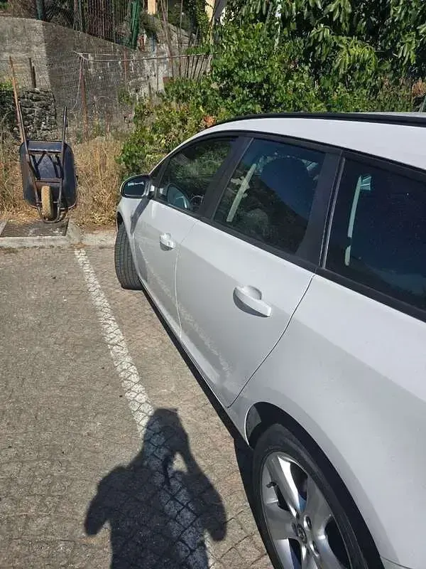 Usata Opel Astra 101 CV (74 kW) 2012 Bianco Station wagon