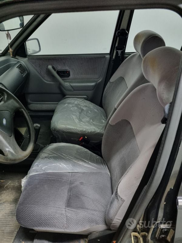 Usata Ford Escort Ghia 61 CV (44 kW) 1990 Nero Berlina