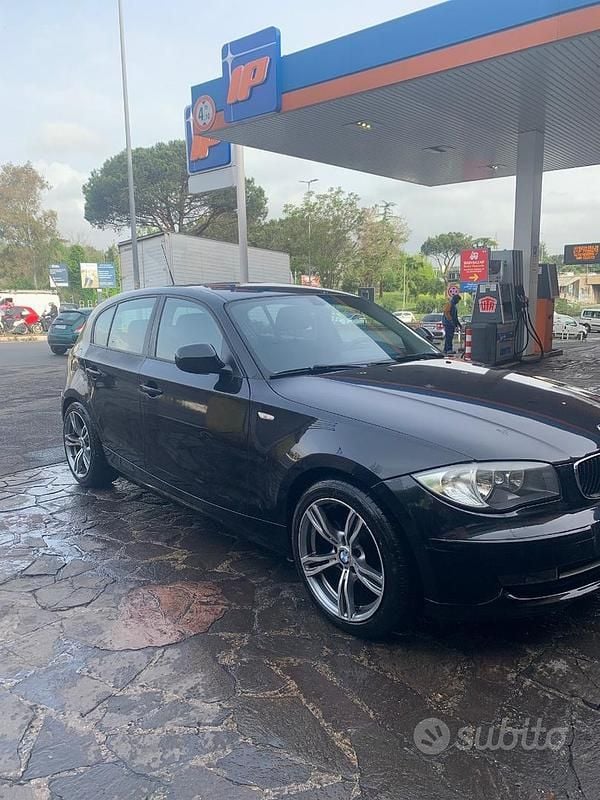 Begagnad BMW 2000 2010 Svart Sedan