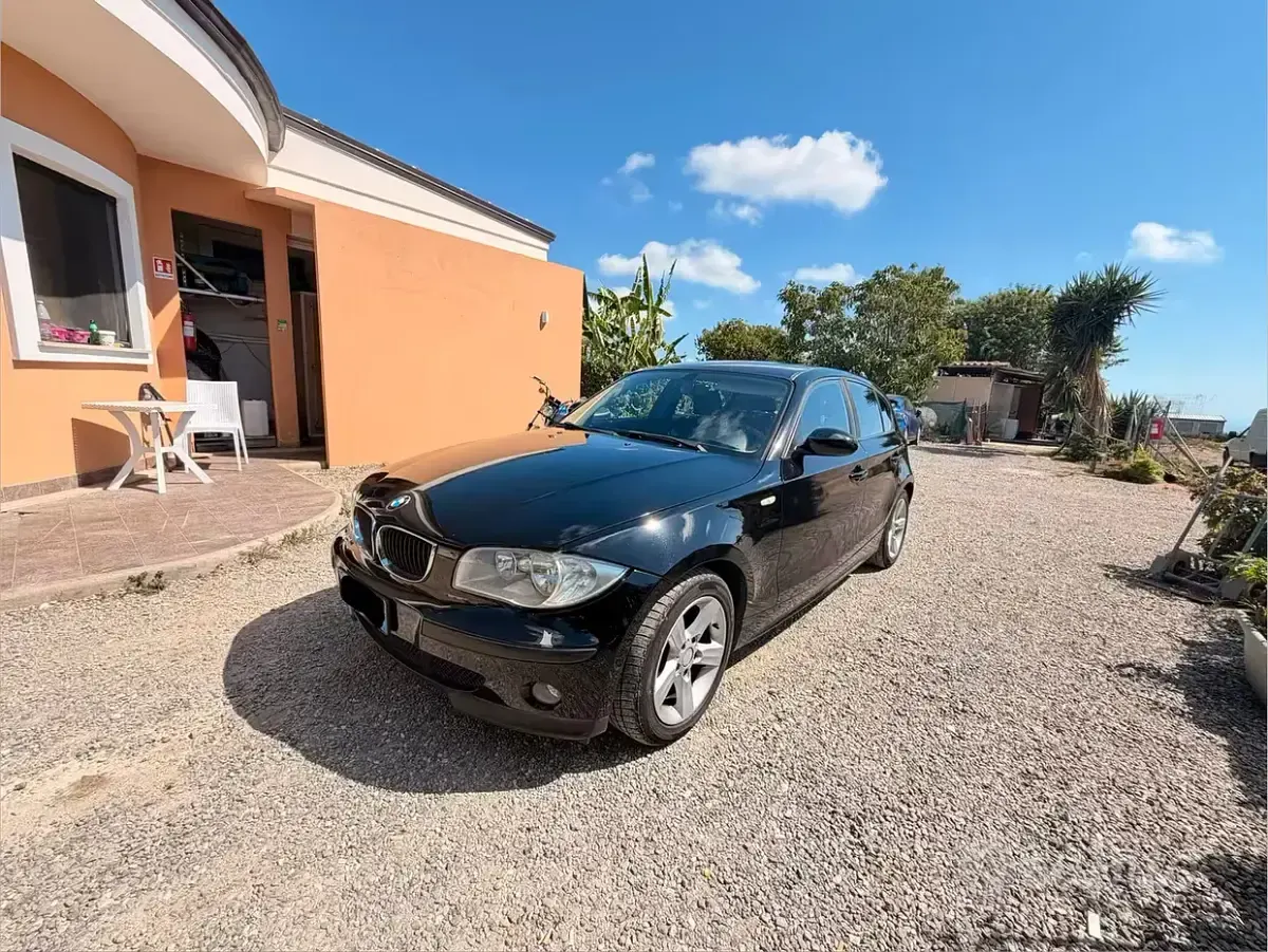 Usata BMW 118 122 CV (89 kW) 2006 Nero Utilitaria
