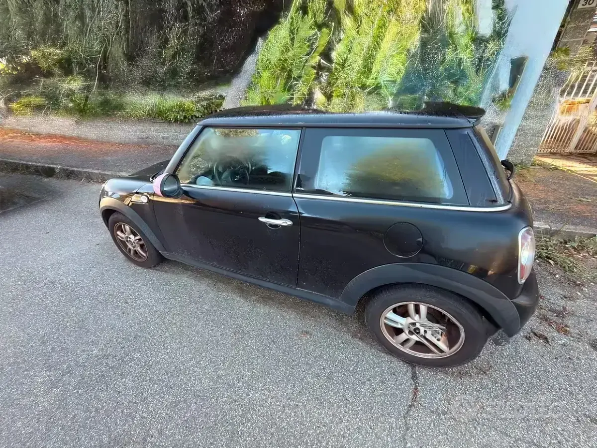 Begagnad Mini Cooper 2012 Svart Halvkombi