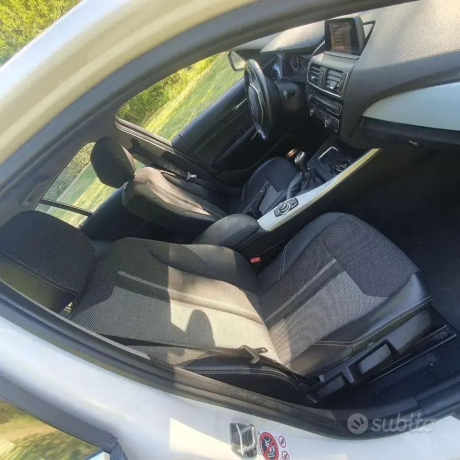 Usata BMW 118 150 CV (110 kW) 2015 Bianco Utilitaria