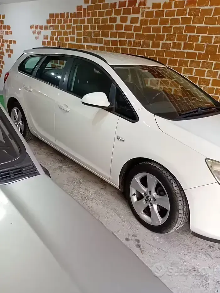 Brugt Opel Astra 95 HK (69 kW) 2011 Hvid Stationcar