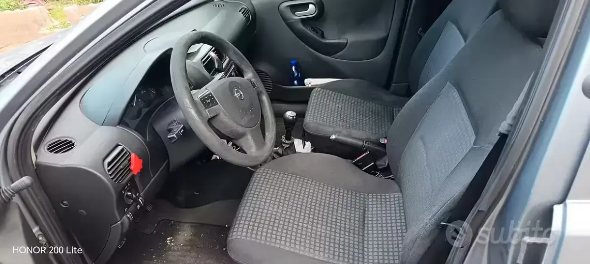 Usata Opel Corsa 69 CV (50 kW) 2004 Grigio Utilitaria