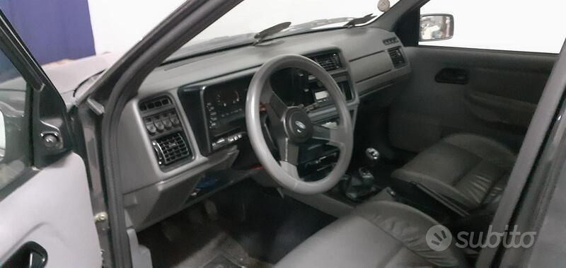 Usata Ford Sierra Ghia 73 CV (53 kW) 1990 Grigio Berlina