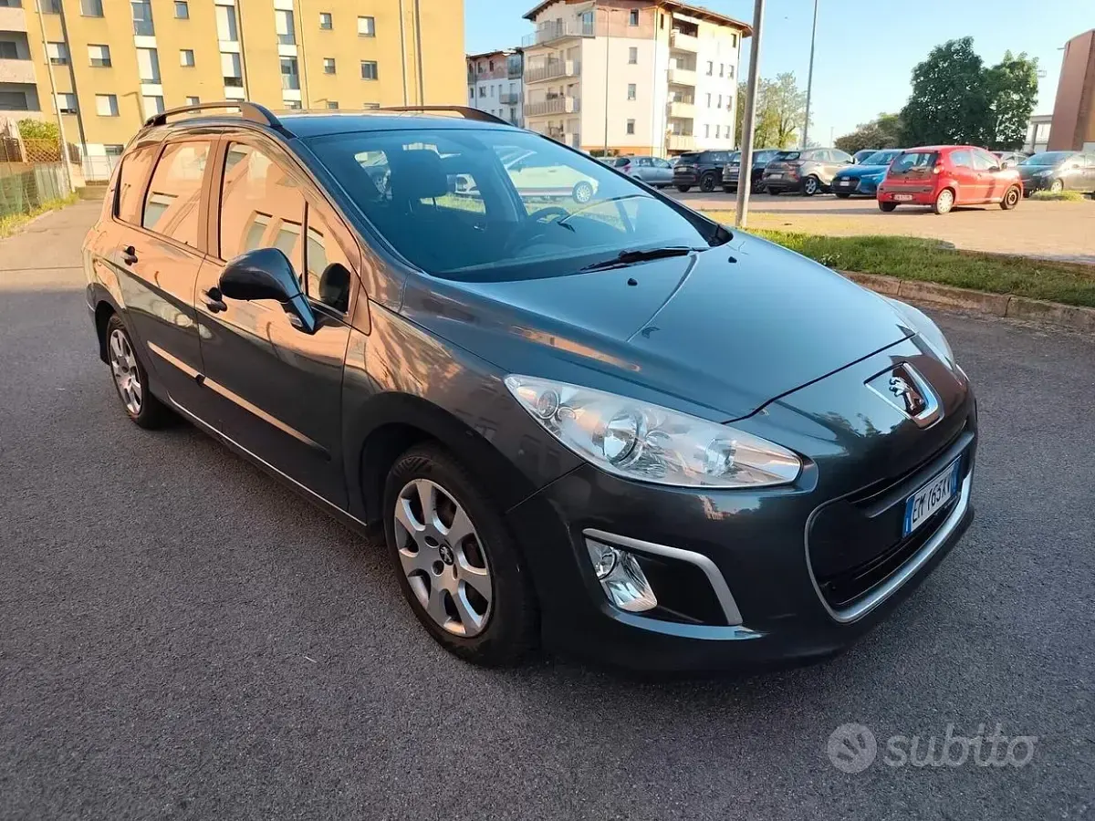 Begagnad Peugeot 308 92 HK (67 kW) 2012 Svart Kombi