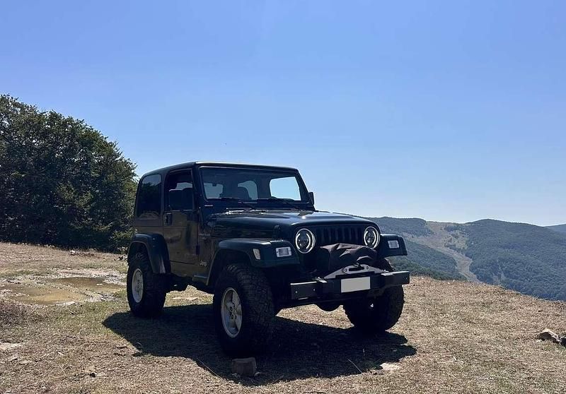 Nero Usata 1997 Jeep Wrangler SUV | 22.000 € (Buon prezzo) - Immagine 1/4