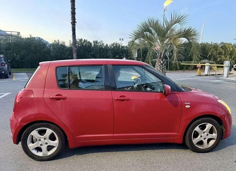 Usata Suzuki Swift GLX 69 CV (50 kW) 2005 Rosso Utilitaria