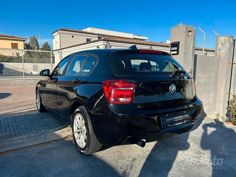 Usata BMW 118 180 CV (132 kW) 2012 Nero Utilitaria