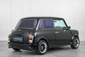 Begagnad Mini Cooper 63 HK (46 kW) 1993 Svart Halvkombi