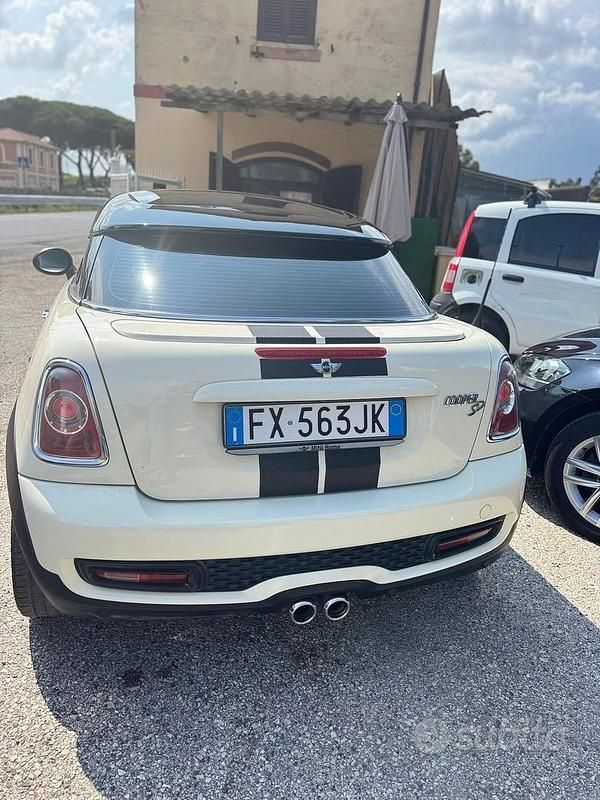 Usata Mini Coupé 143 CV (105 kW) 2013 Giallo Coupé