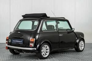 Begagnad Mini Cooper 58 HK (42 kW) 1998 Svart Halvkombi