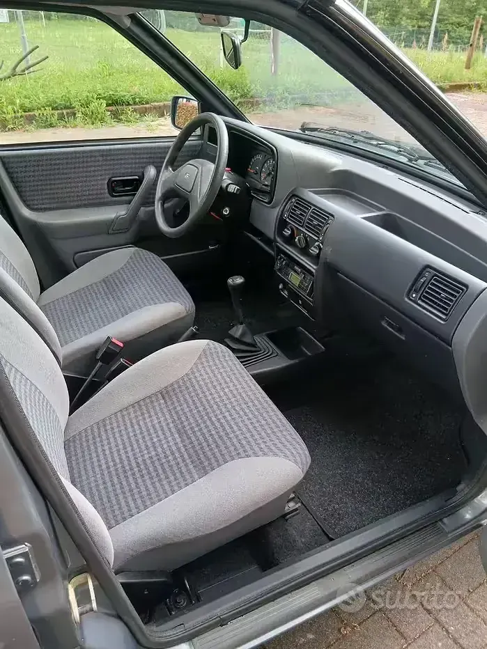 Usata Ford Escort 73 CV (53 kW) 1991 Grigio Berlina