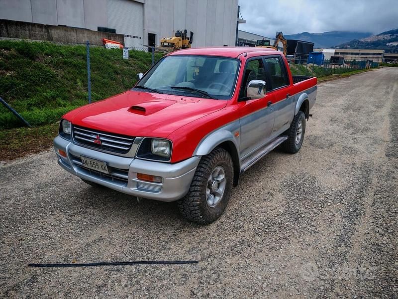 Rosso Usata 1998 Mitsubishi L200 Pick-up | 8990 € (Buon prezzo) - Immagine 1/4