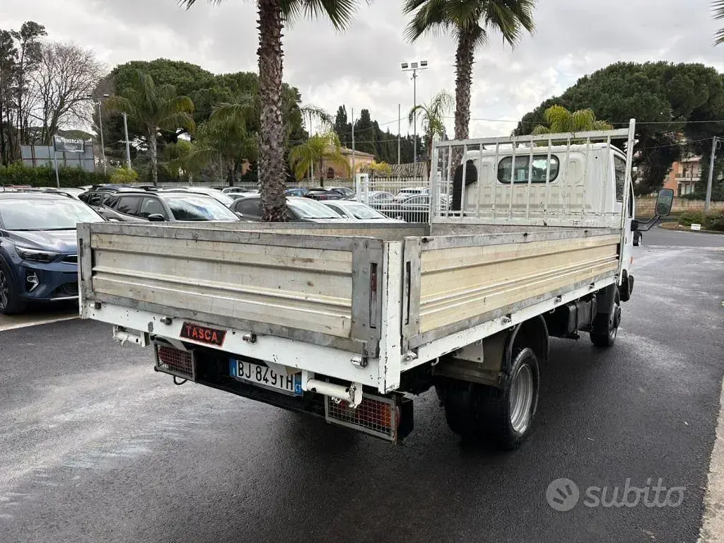 Usata Nissan Cabstar 106 CV (77 kW) 2000 Bianco Pick-up