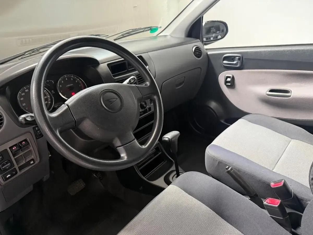 Usata Daihatsu Cuore 58 CV (42 kW) 2003 Argento Utilitaria