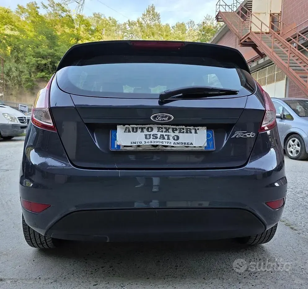Second-hand Ford Fiesta Titanium 60 CP (44 kW) 2014 Albastru Hatchback