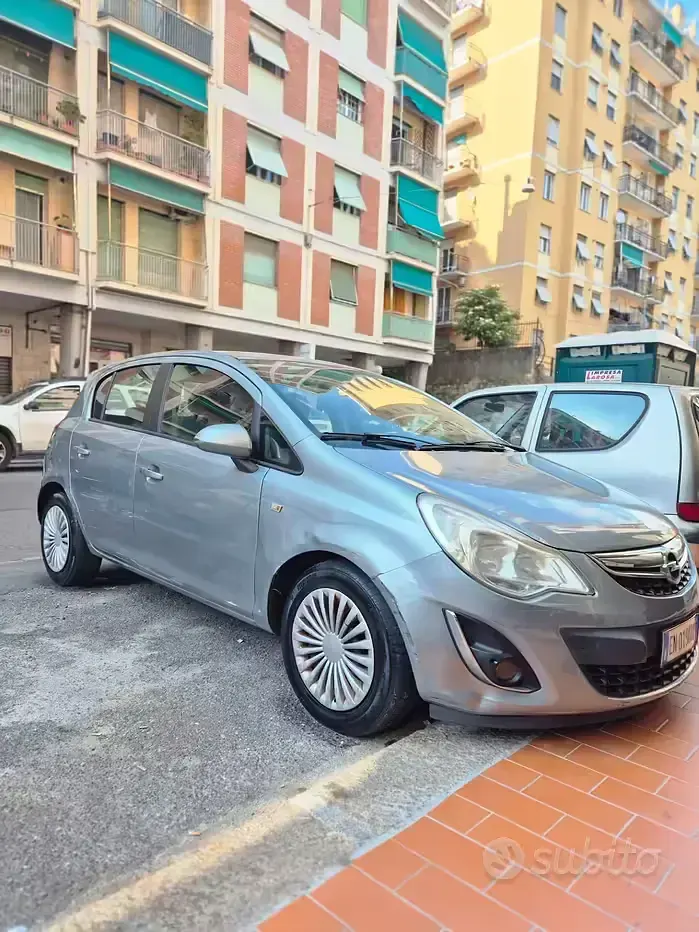 Usado Opel Corsa 75 HP (55 kW) 2012 Cinzento Citadino