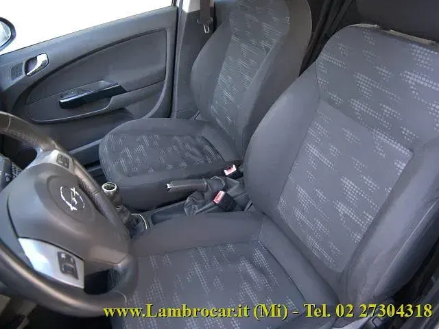 Używany Opel Corsa 84 KM (61 kW) 2011 Srebrny Hatchback