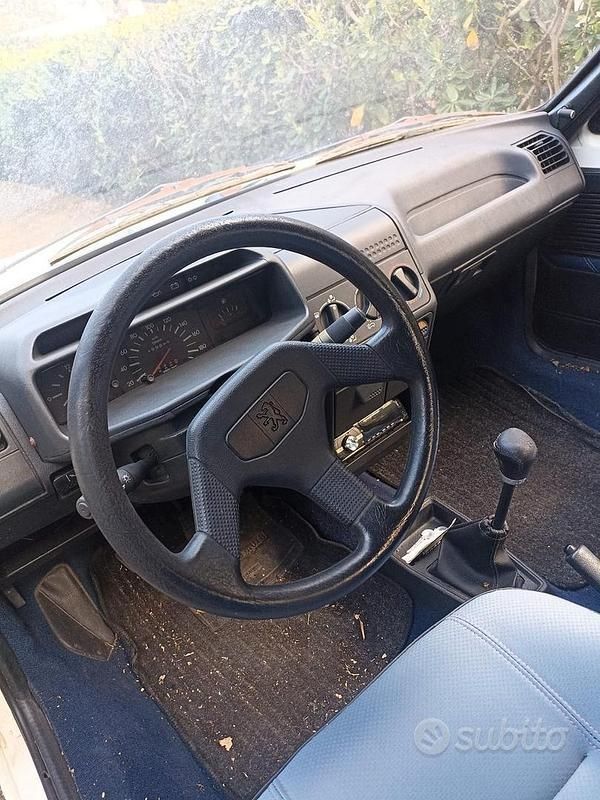 Usata Peugeot 205 54 CV (39 kW) 1991 Bianco Cabrio