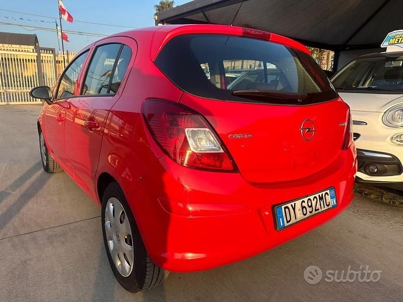 Usata Opel Corsa 74 CV (54 kW) 2009 Rosso Utilitaria