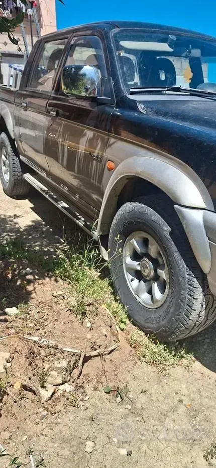 Usata Mitsubishi L200 100 CV (73 kW) 1999 Nero Pick-up