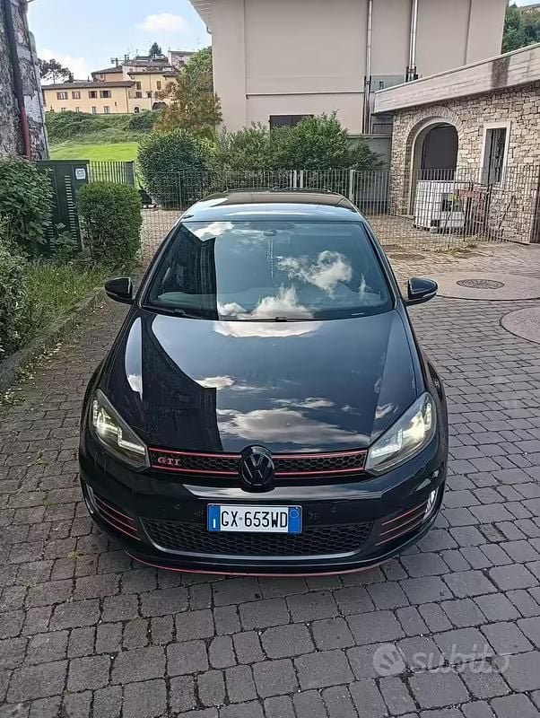 Second-hand VW Golf VII GTI 210 CP (154 kW) 2012 Negru Berlinǎ